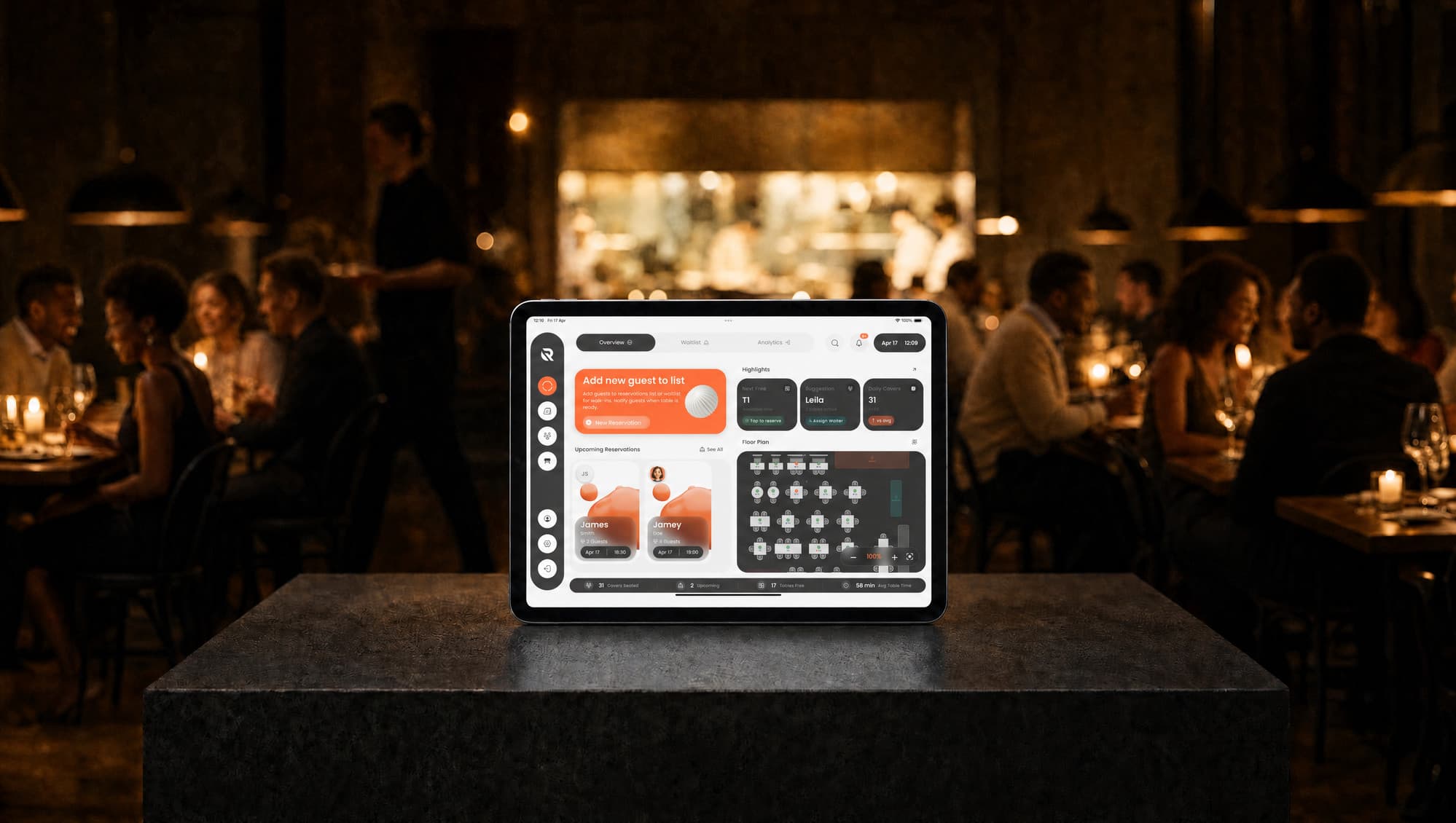 The Rezzr floor-management dashboard on an iPad, on a restaurant table during service